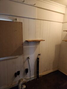 Laundry room before